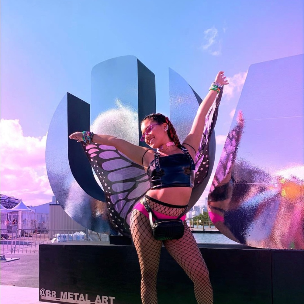 Glossy black crop top with belt straps